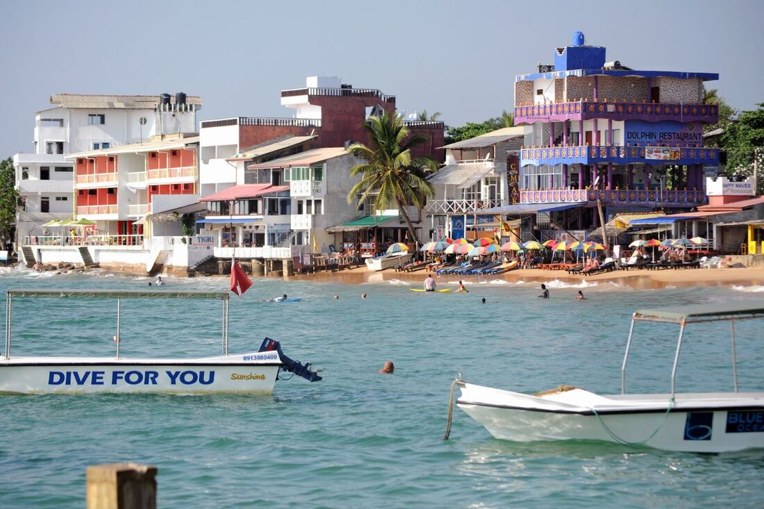 Dolphin hotel and restaurant area of Hikkaduwa beach on the east coast of Sri Lanka