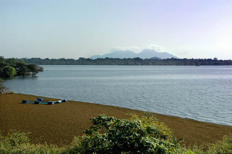 Kalawewa reservoir with Ritigala in the background