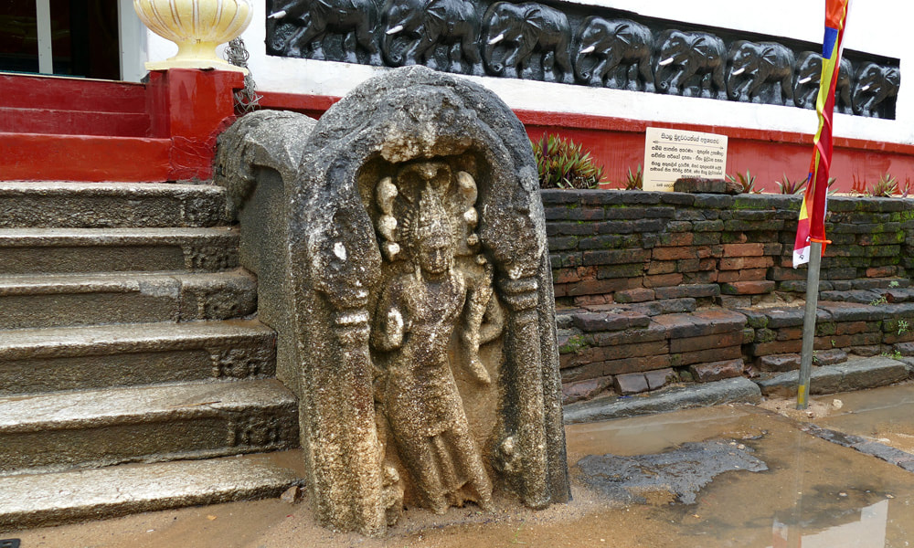 guardstone with Nagaraja at the Dematamal Viharaya