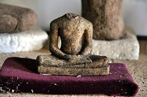 headless Buddha statues in the Ramba Vihara archaeological museum