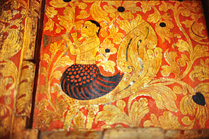 14th century painting of a trumpeting Kinnara in te Gadaladeniya Viharaya