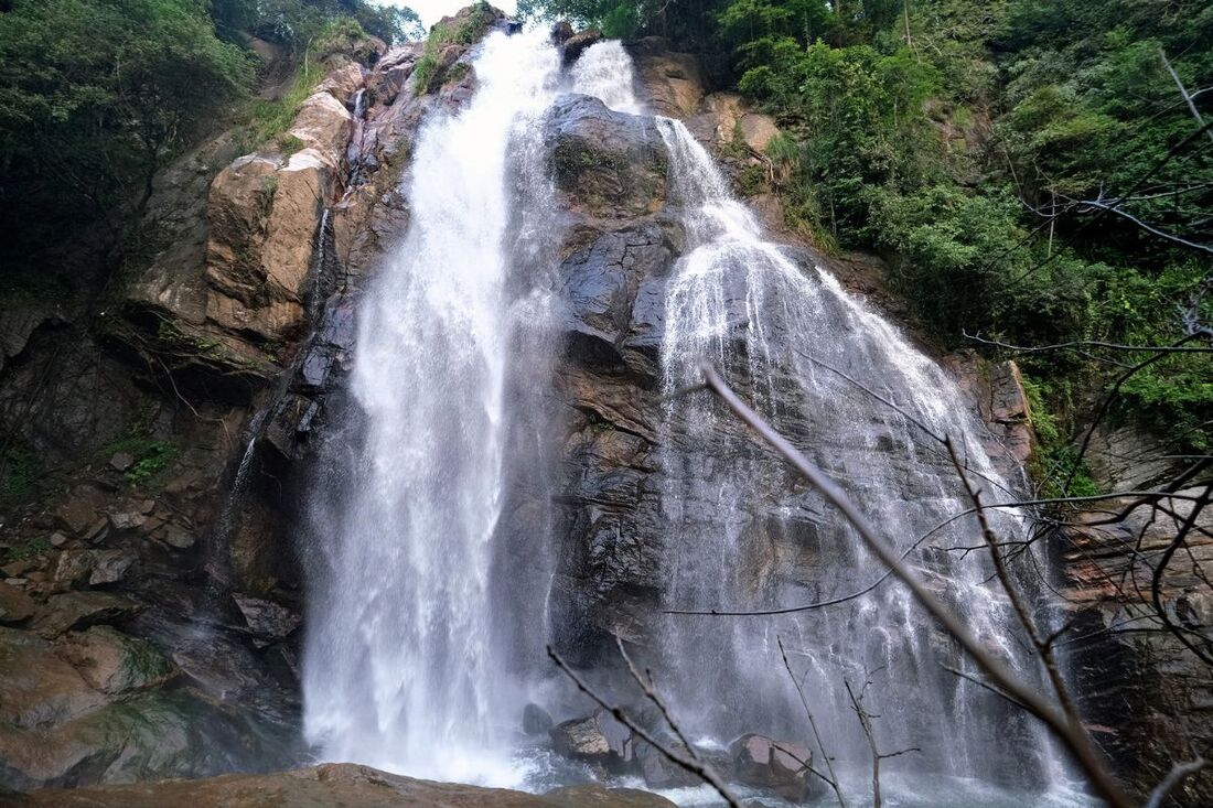 remote and rarely visited Arawakumbura waterfalls in Sri Lanka's Uva Province