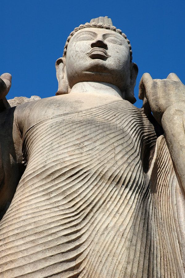 Aukana rock-cut Buddha statue in Sri Lanka