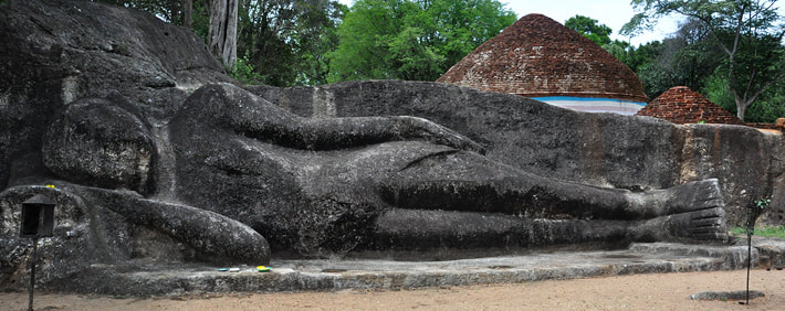 rock-cut reclining Buddha in Bakamuna in Sri Lanka