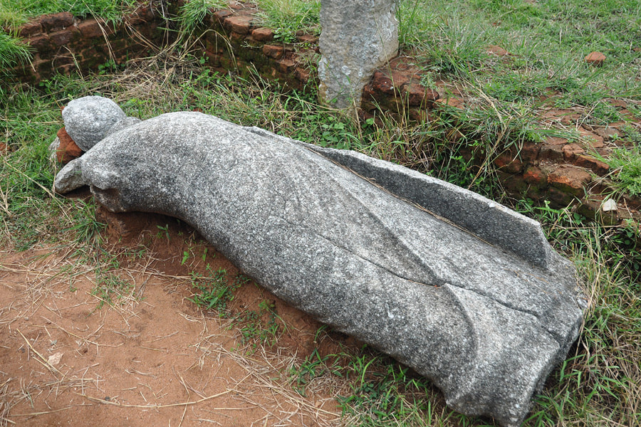 toppled Buddha statue in Thiriyai in northeastern Sri Lanka
