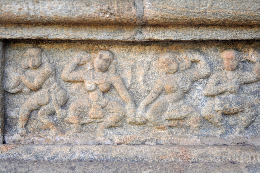 carvings depicting drummers and female dancers in Gadaladeniya