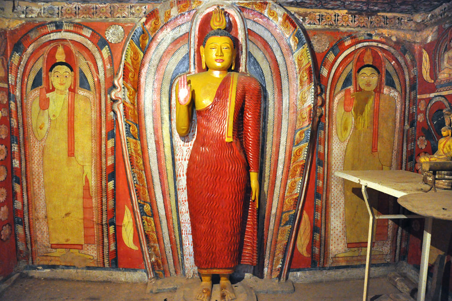 Sculpture and murals in Dambadeniya depicting the Buddha