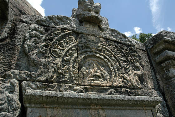 Gajalakshmi relief at window pediment in Yapahuwa