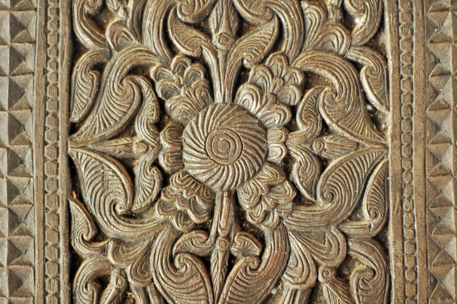 floral ornaments carved in the Embekke temple