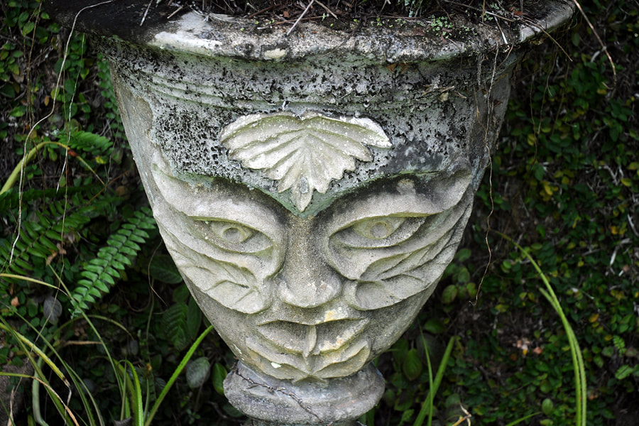 jar with floral face in Brief Garden