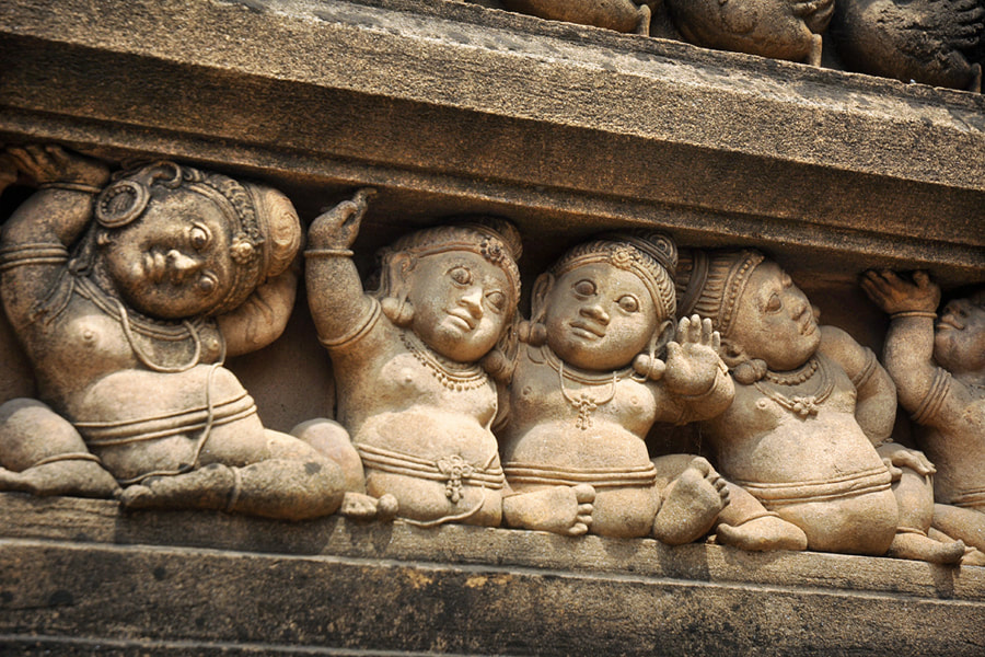 Gana gnomes at the wall of the main temple building in Kelaniya