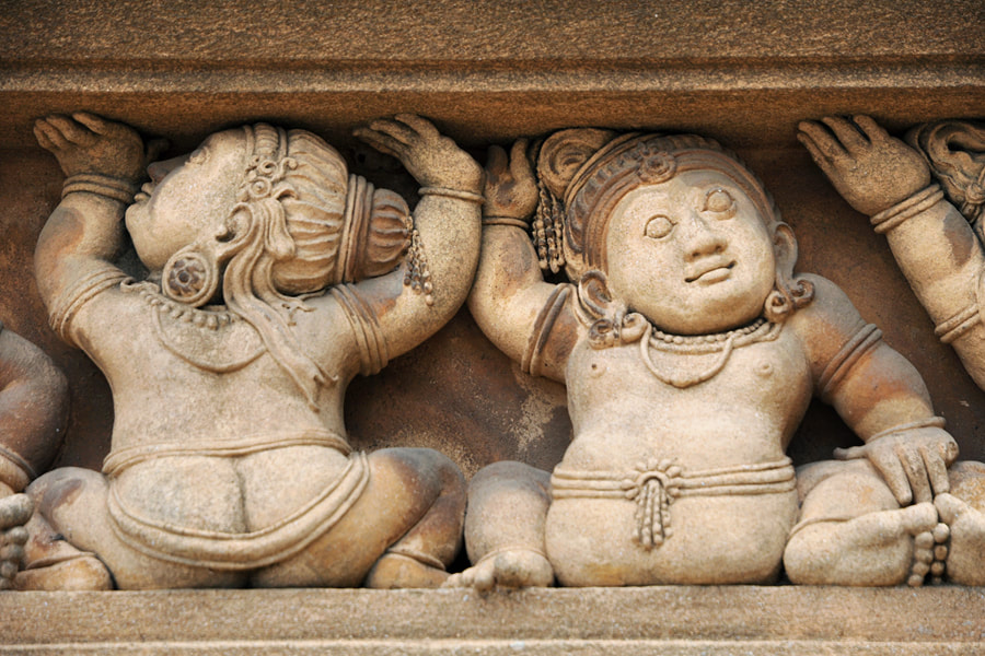 dwarf sculptures at the Kelaniya temple