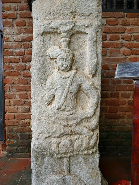 stone carving depicting Kubera exhibited in Tissamaharama