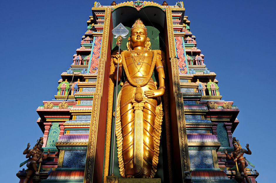 Murugan statue in the Gopuram of Punchi Kataragama temple in Madampe