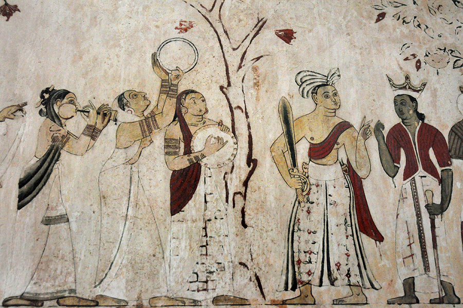 flowers depicted at a mural in a cave shrine of Mulkirigala