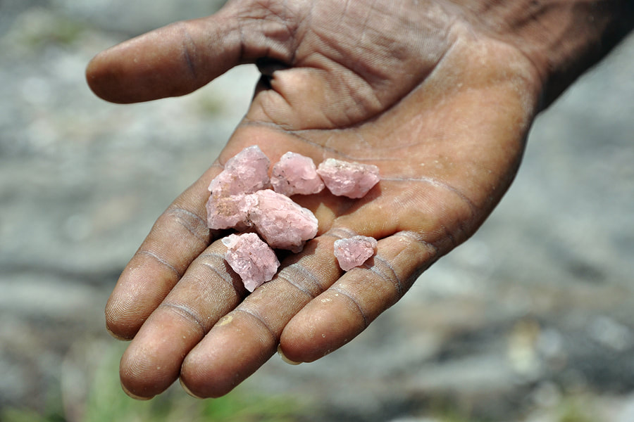 Namal Uyana rose quartz in a hand