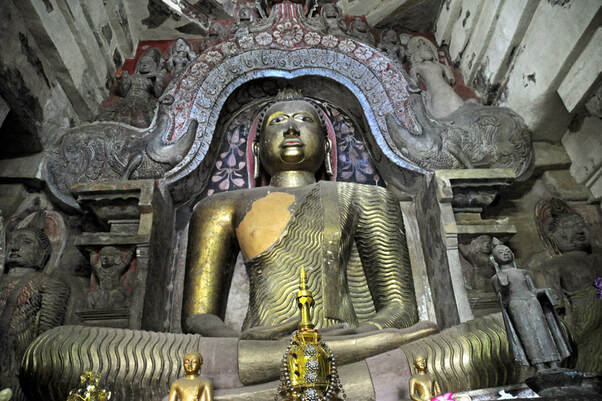 Seated Buddha statue inthe main shrine room of the Gadaladeniya Temple