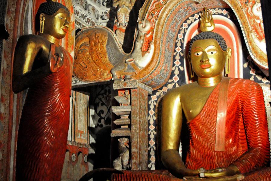 Buddha sculptures and Kandy paintings in the Lankatilaka image house