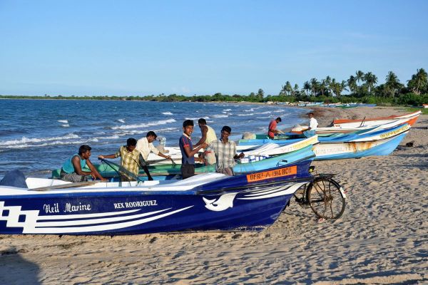 Fishing boats at Thenaddi Beach in eastern Sri Lanka 