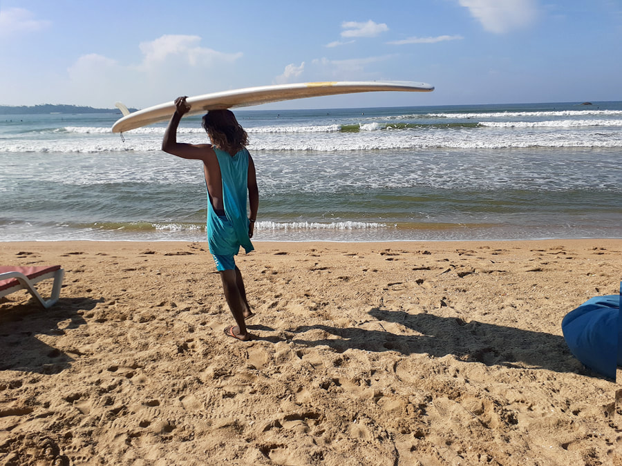 surfer at Weligama Beach